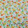 Baumwolljersey Retro Blumen Orange Grün